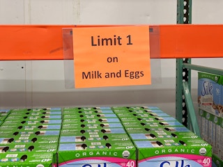 A sign for eggs and milk that reads "limit 1