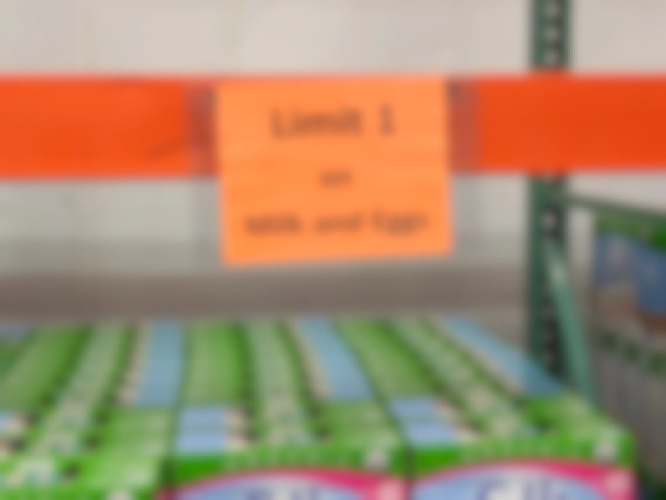 A sign for eggs and milk that reads "limit 1