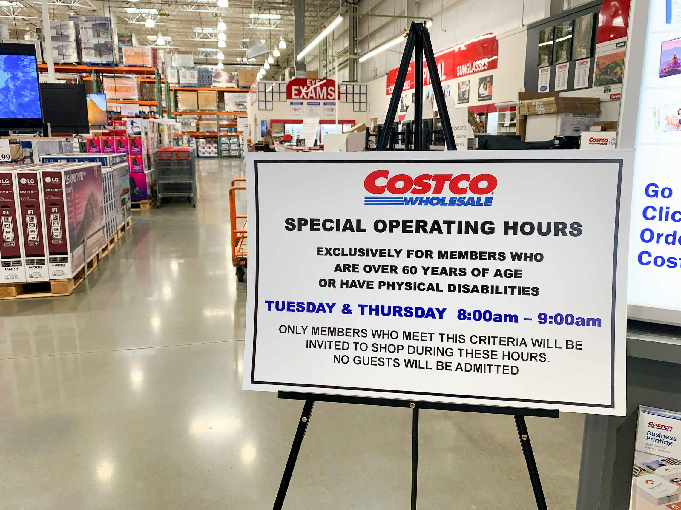 A Costco sign explaining the "special operating hours" for seniors and people with disabilities.