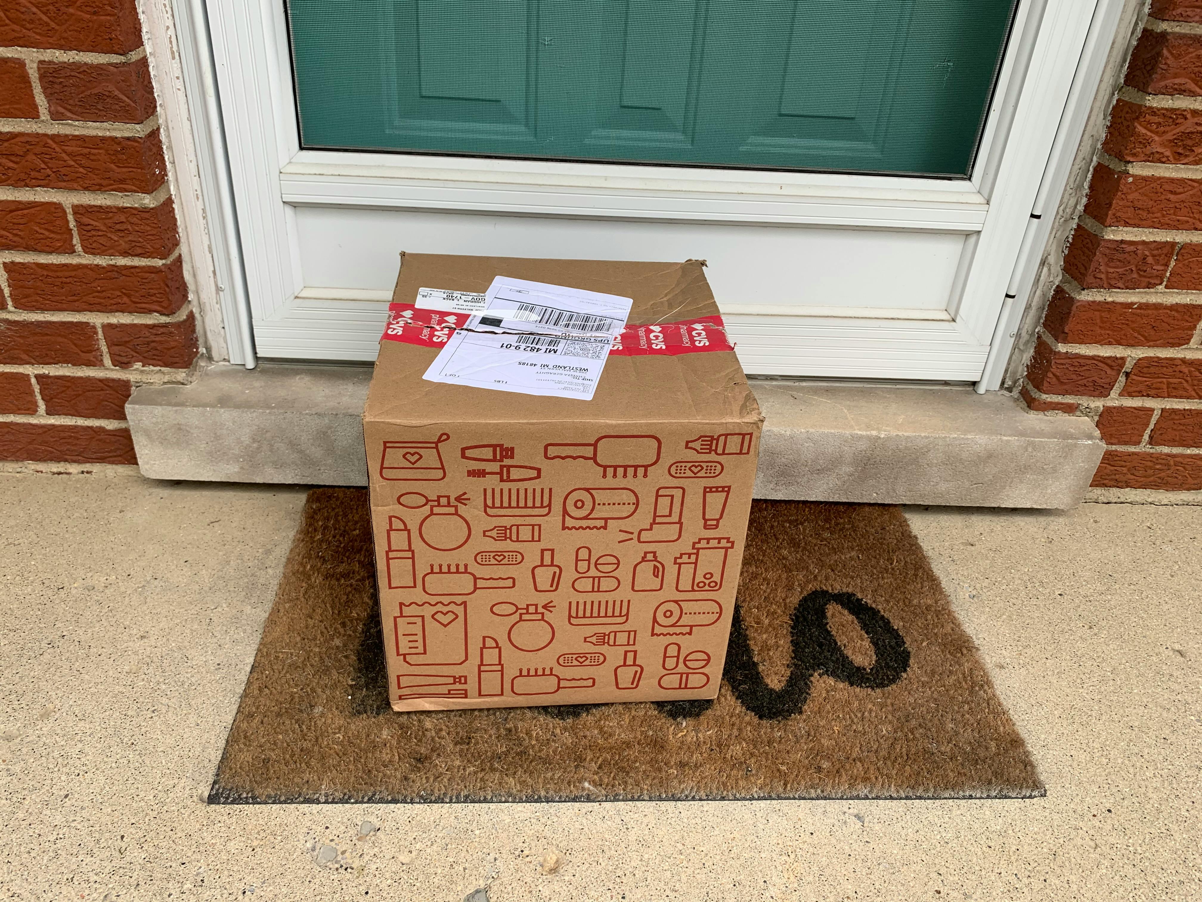 box from CVS sits on porch