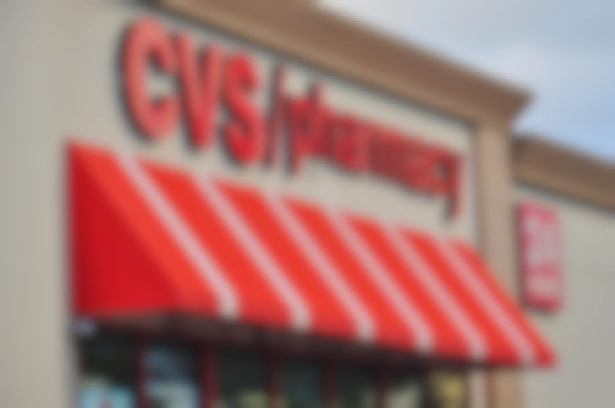 A CVS pharmacy store front and sign.