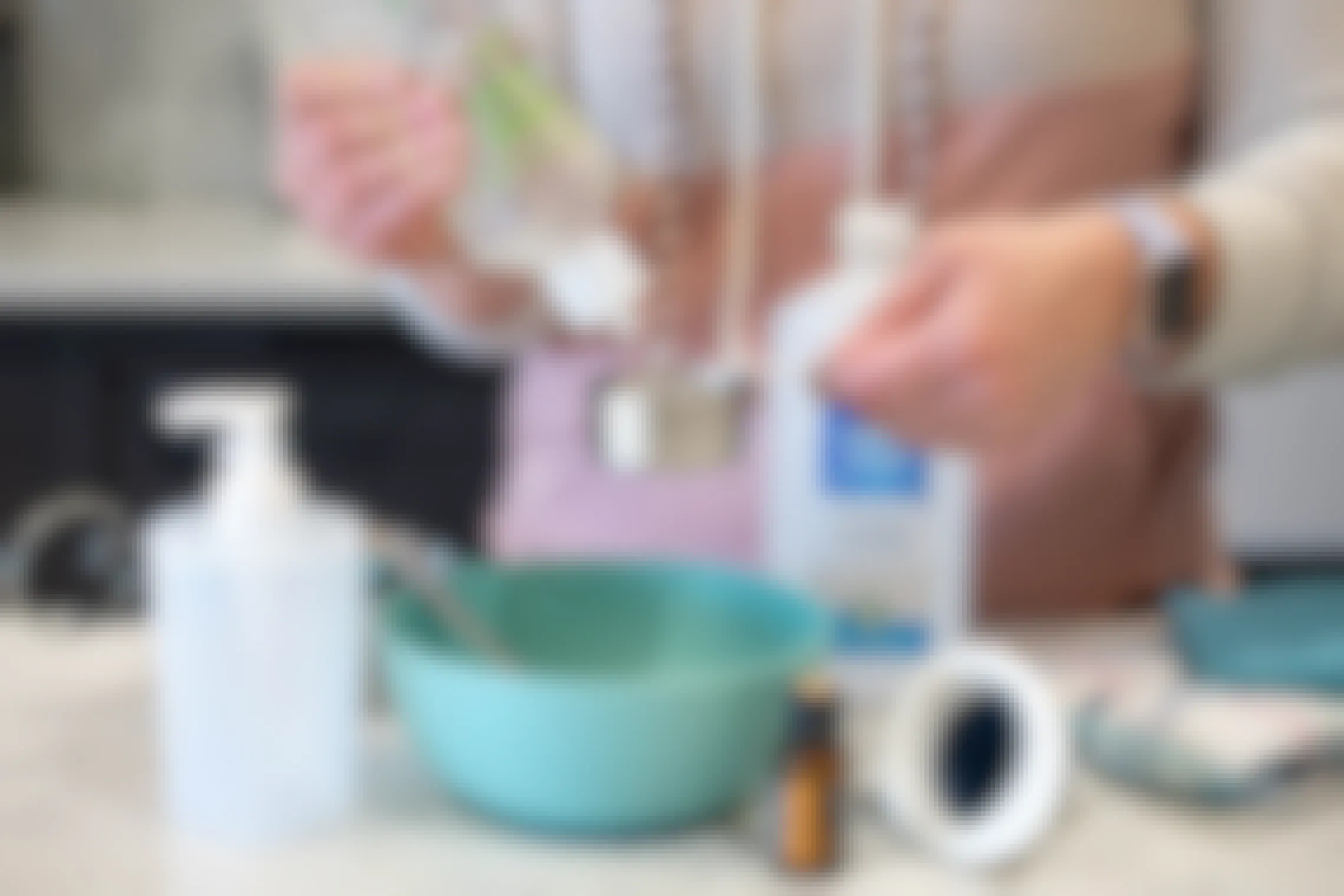 Woman making DIY hand sanitizer at home