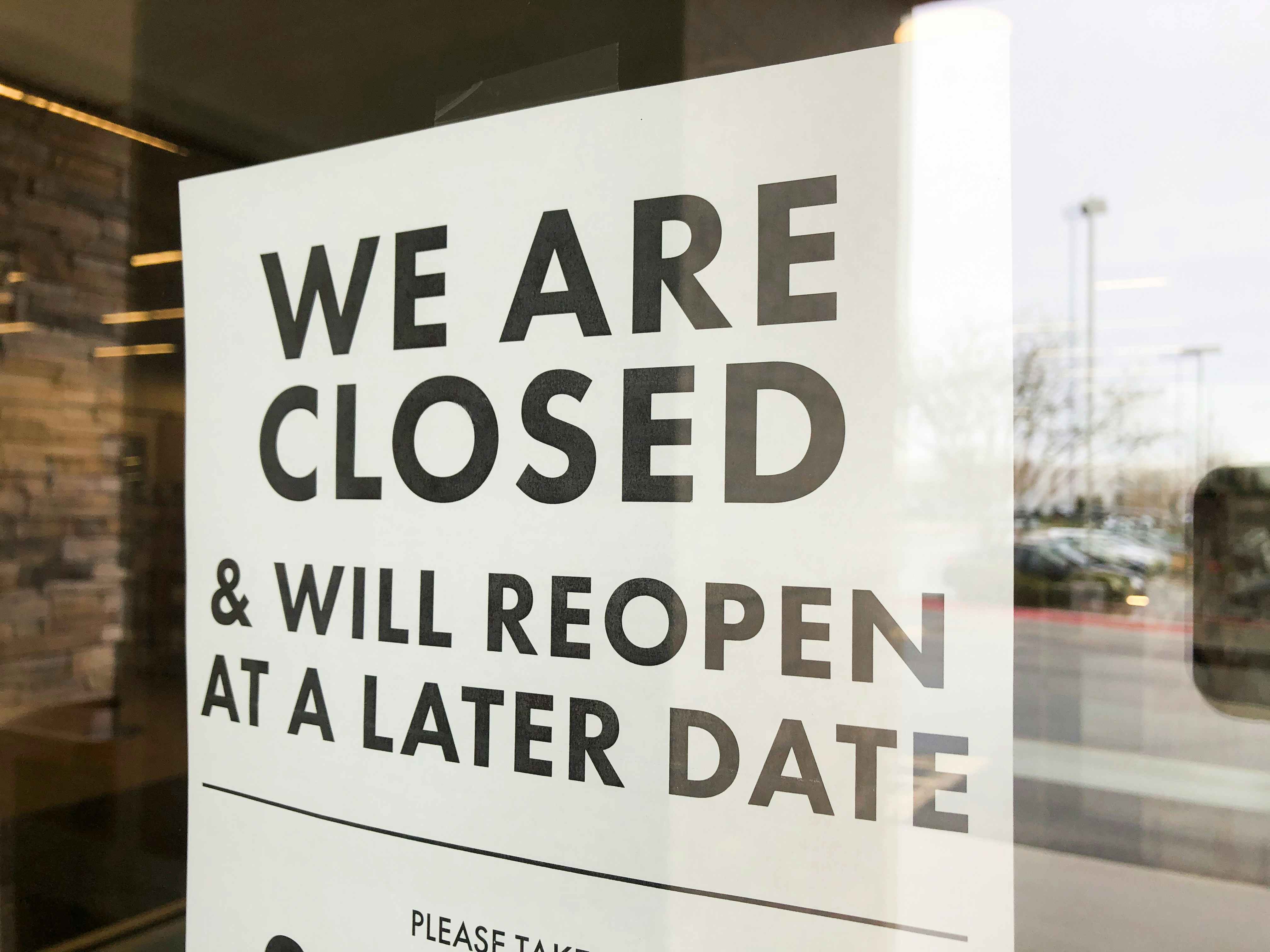 A closed sign at DSW during the coronavirus.