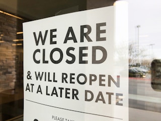 A closed sign at DSW during the coronavirus.
