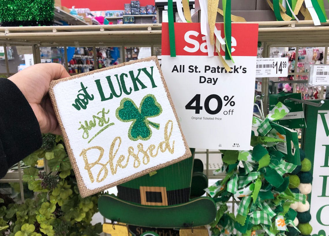 Someone shopping for St Patricks Day decor at Michaels
