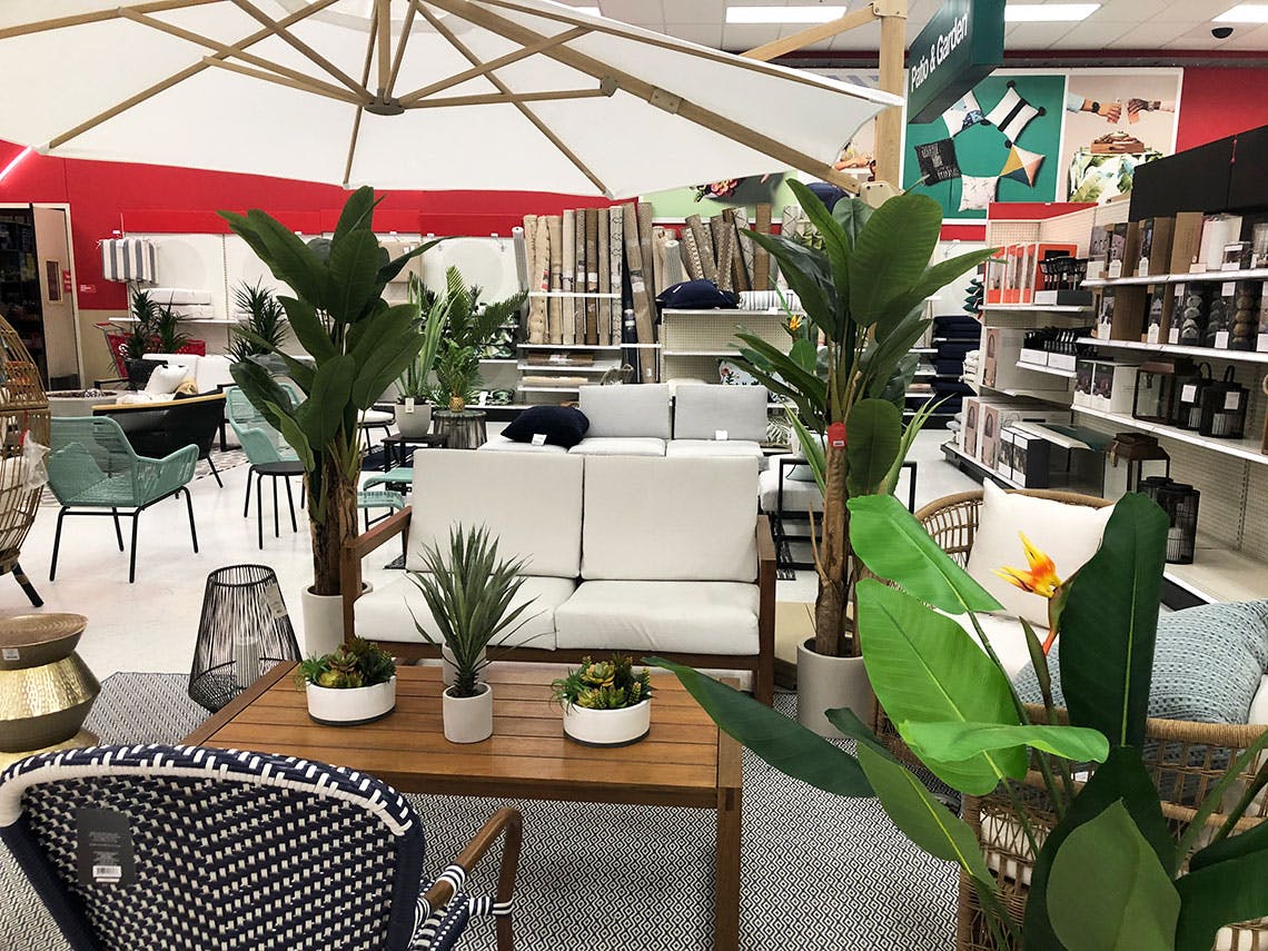 Patio furniture on display at a store.