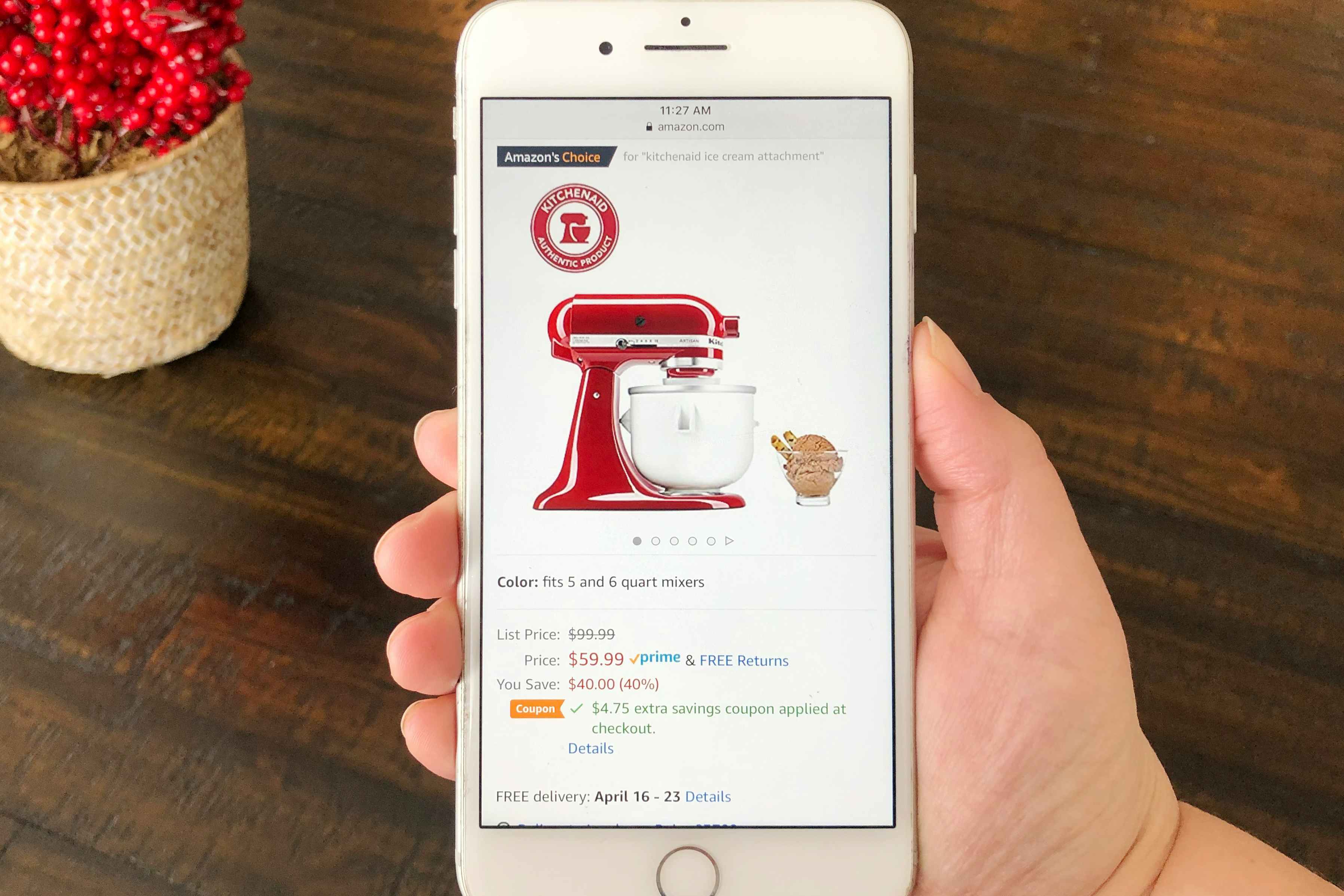 A phone screen with an amazon sale on the ice cream attachment for a Kitchenaid mixer.