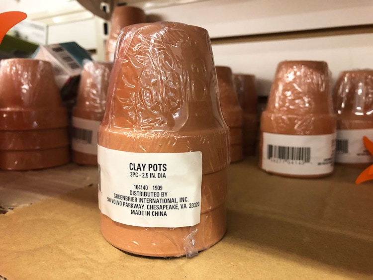 Dollar Tree clay pots in three packs.