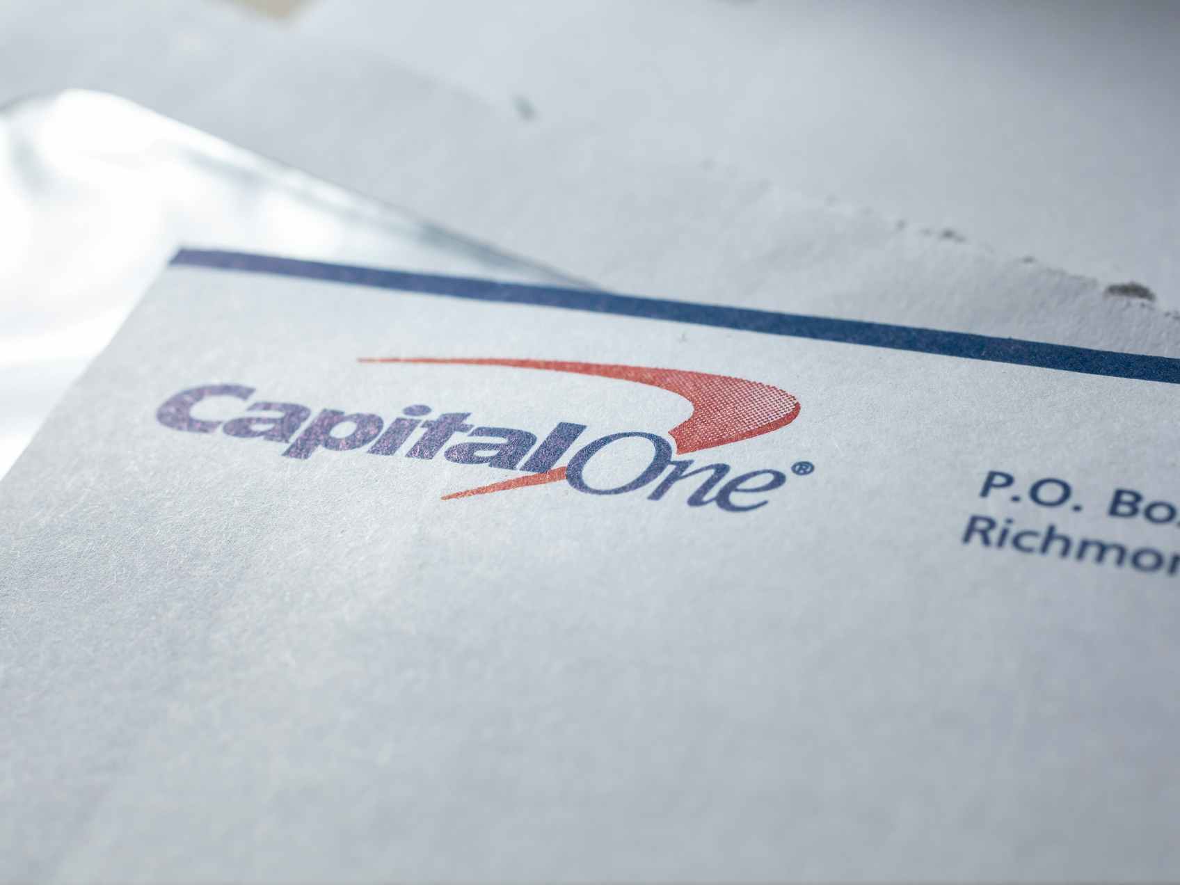 A Capital One envelope with a bill in it