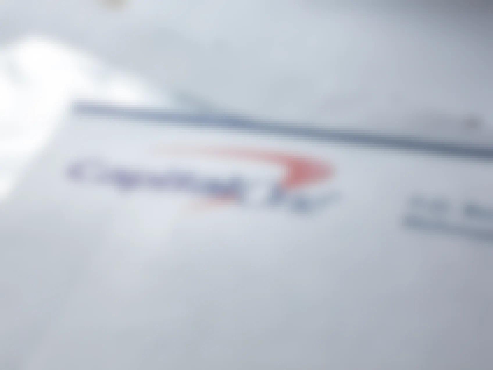A close up of a Capital One envelope with a bill in it.
