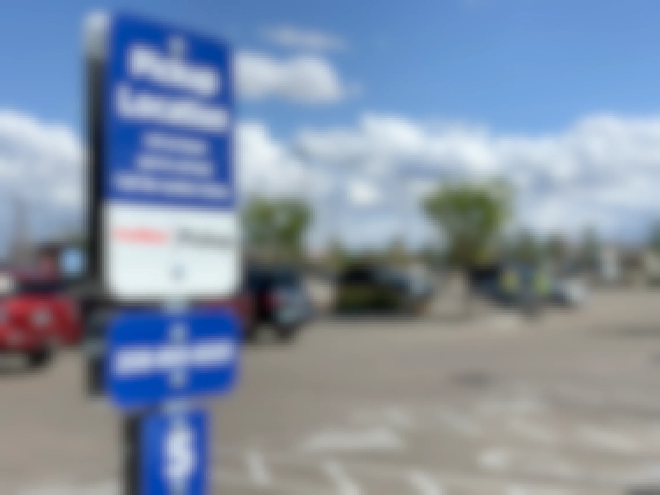 A pickup location sign in the Fred Meyer parking lot.