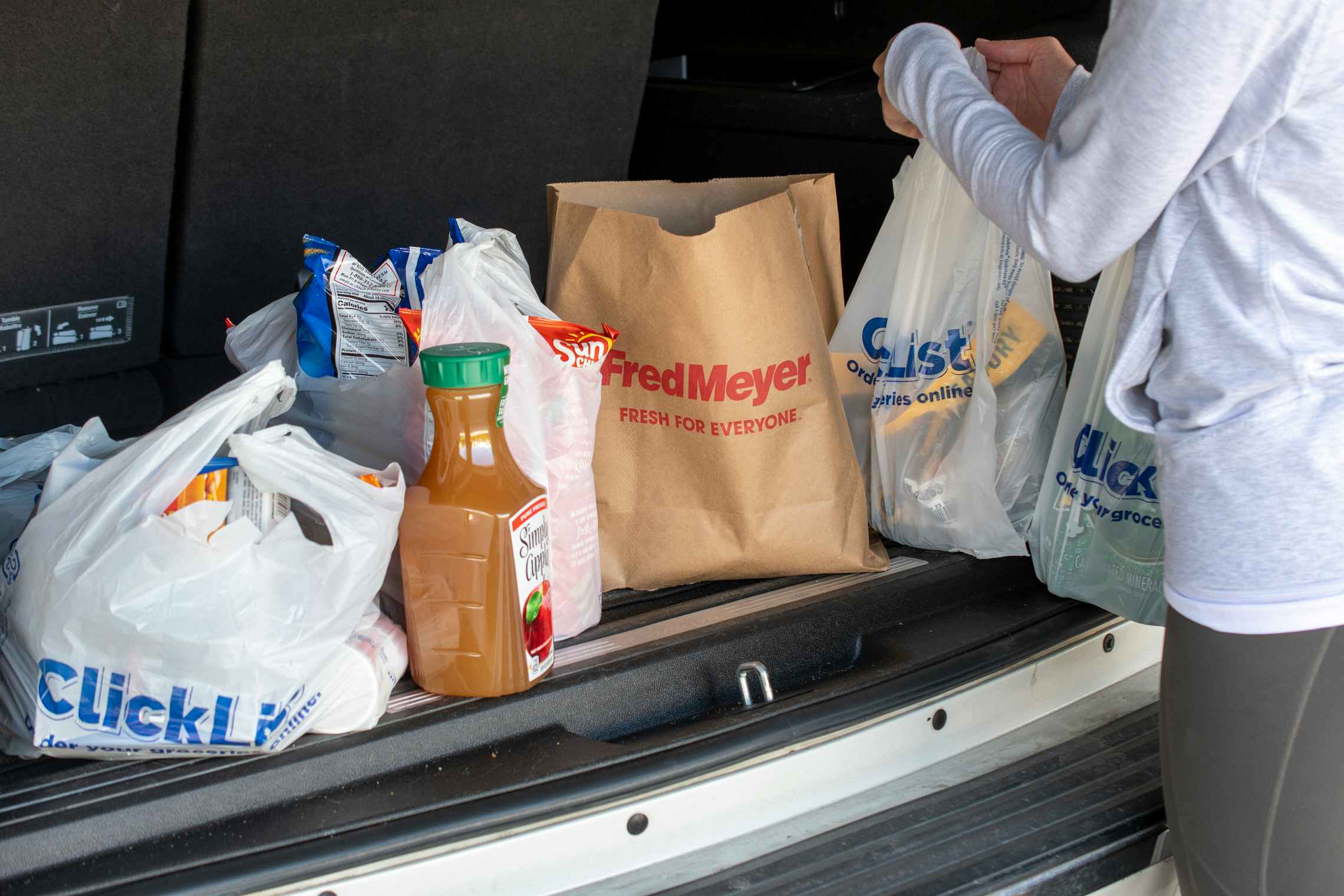 Fred Meyer grocery pickup groceries in the trunk.