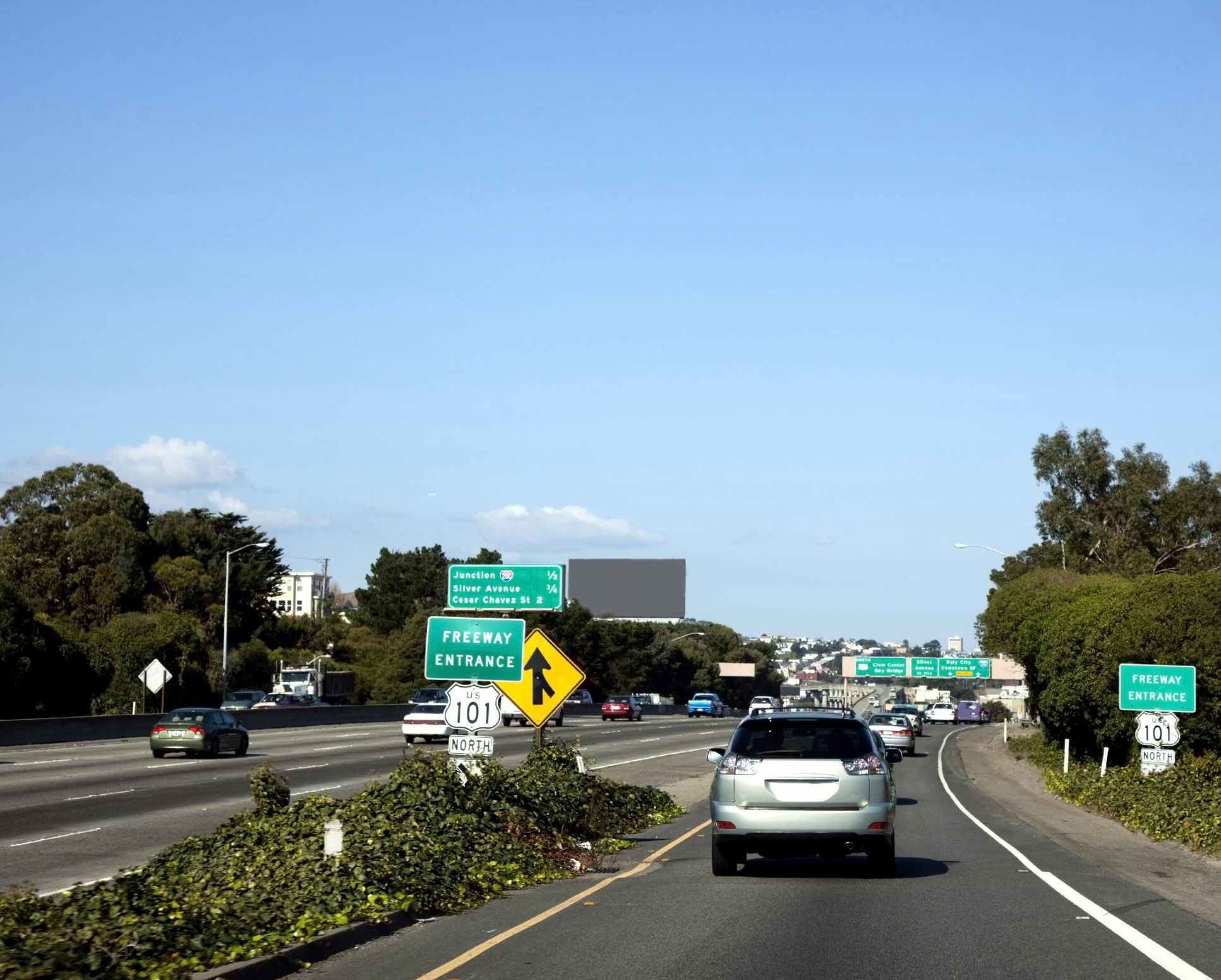 Car merging onto freeway traffic in California.