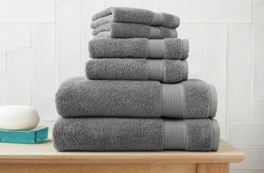 Some StyleWell towels from Home Depot on a bathroom table