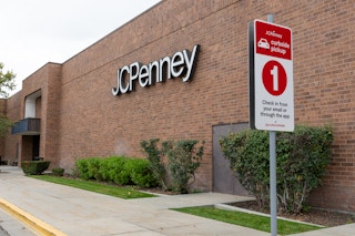 JCPenny store front with curbside pickup sign