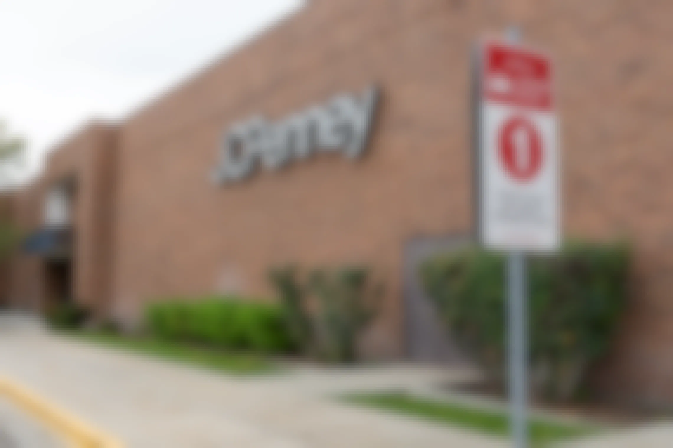 JCPenny store front with curbside pickup sign