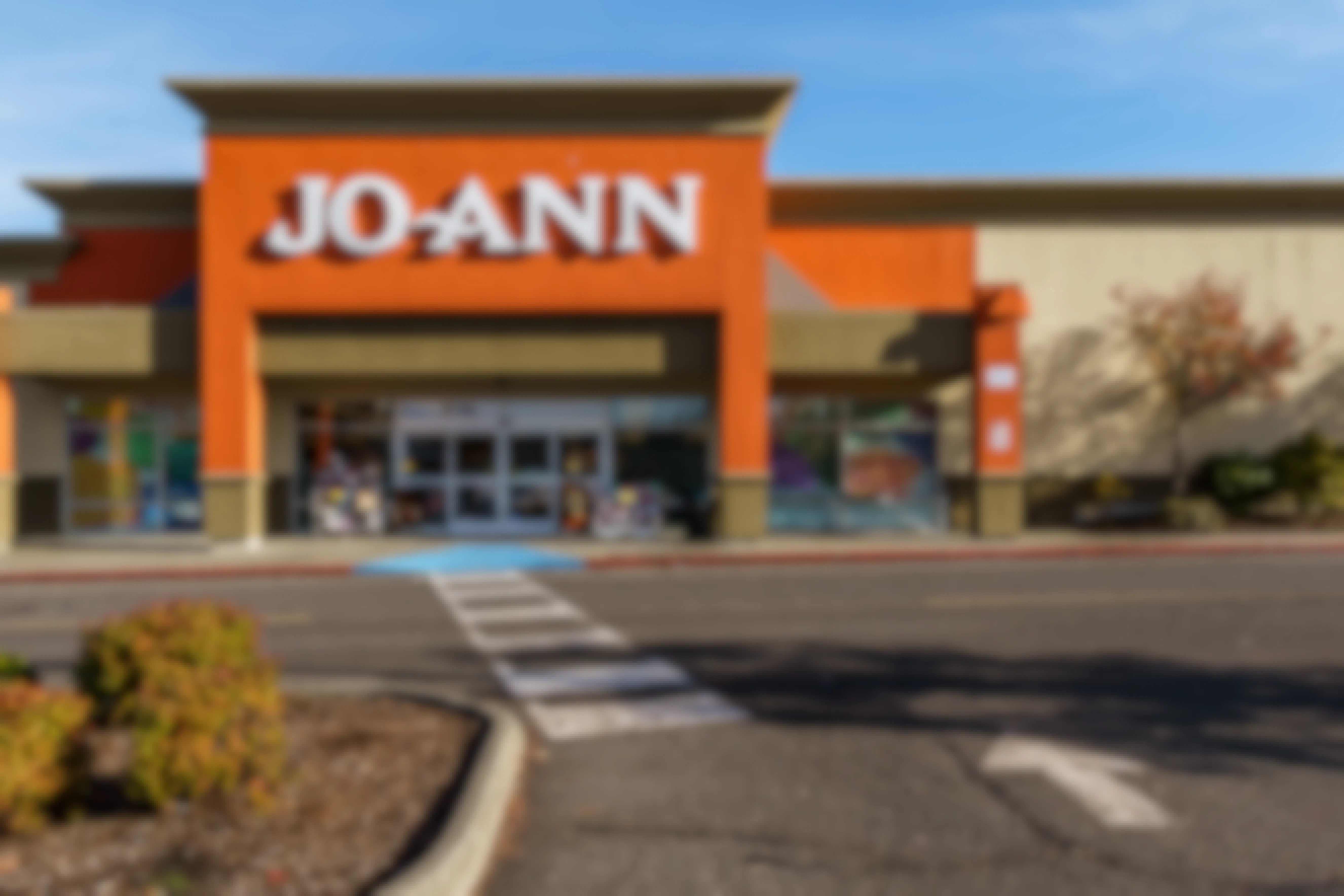 JOANN craft storefront and parking lot.