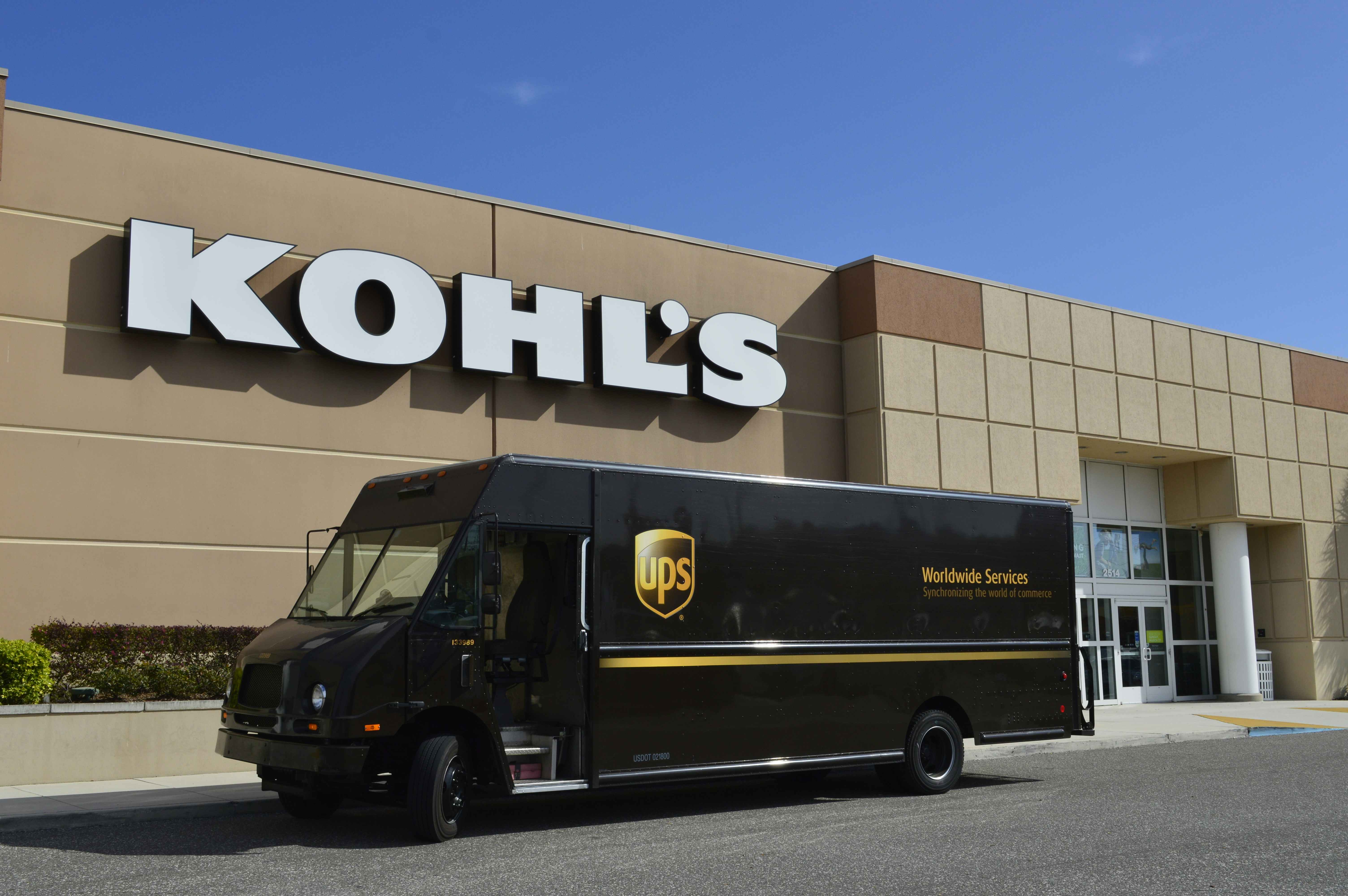 UPS truck in front of a Kohl's store