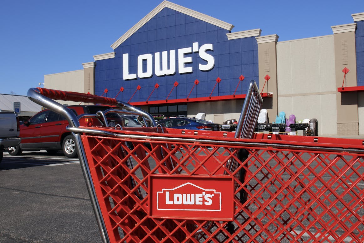 red lowe's shopping cart outside of Lowe's store