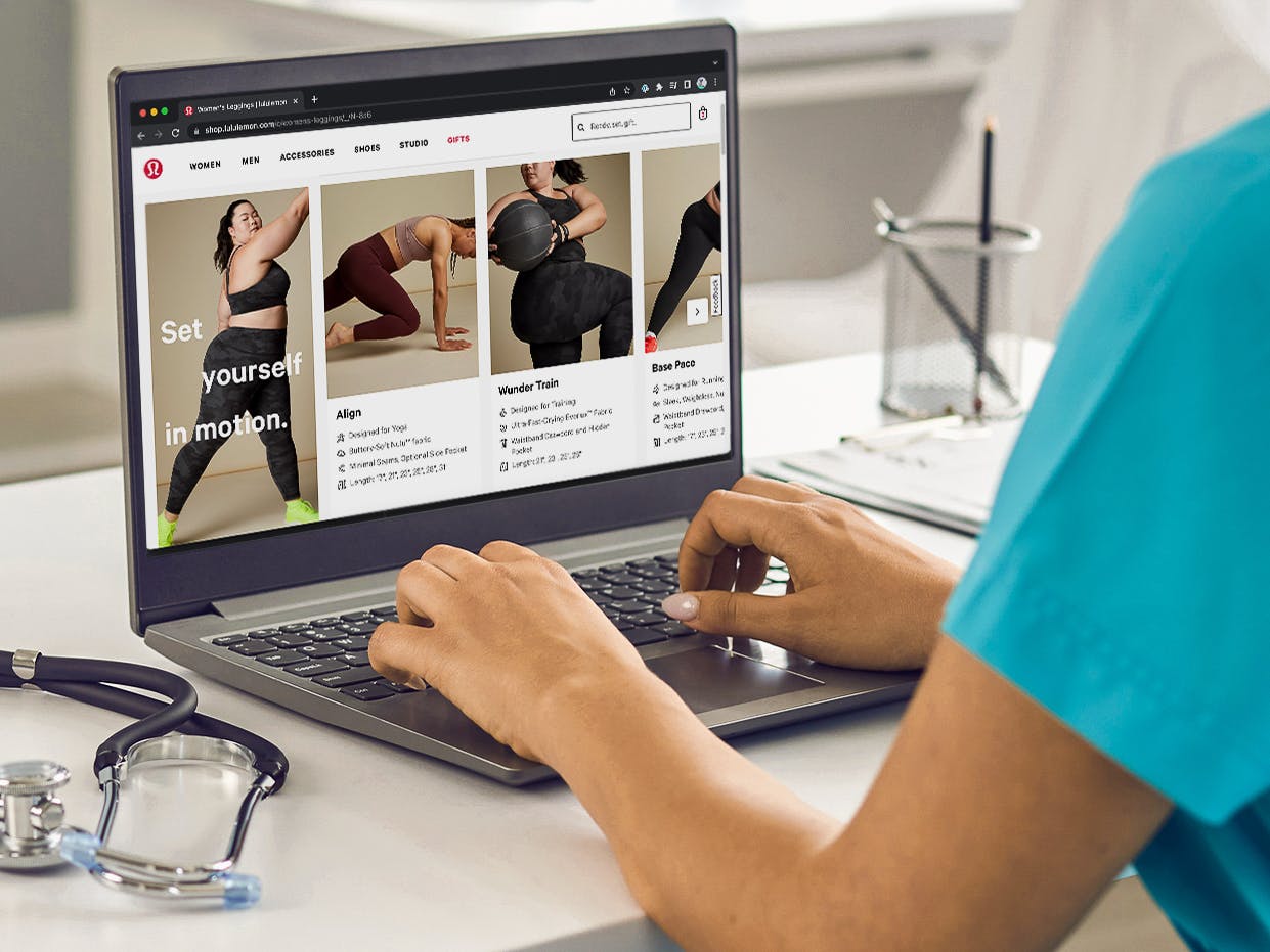 A nurse shopping online for Lululemon activewear