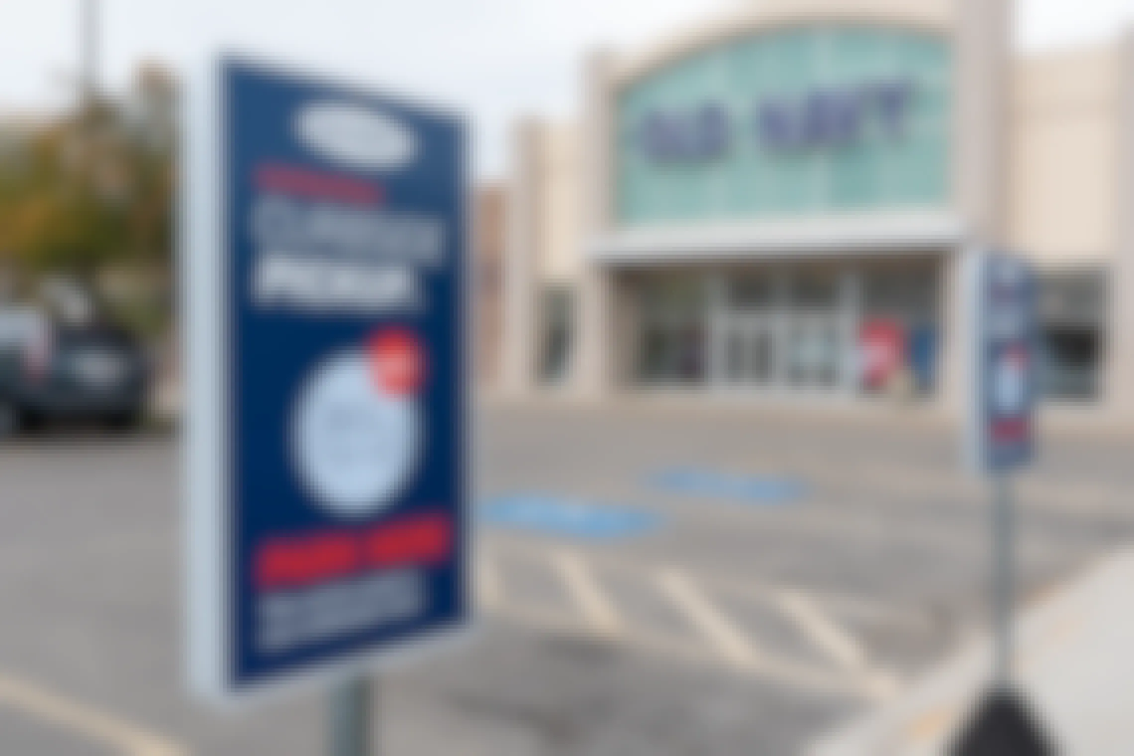 Old Navy store front with curbside pickup sign