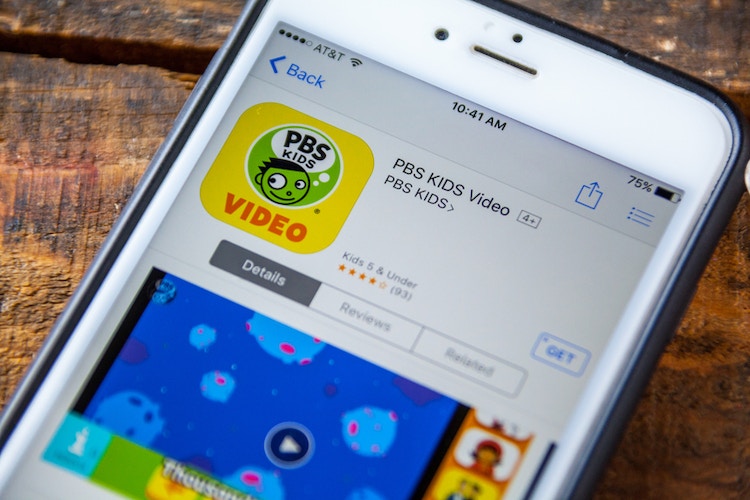 A smart phone displays a download page for the PBS Kids Games app
