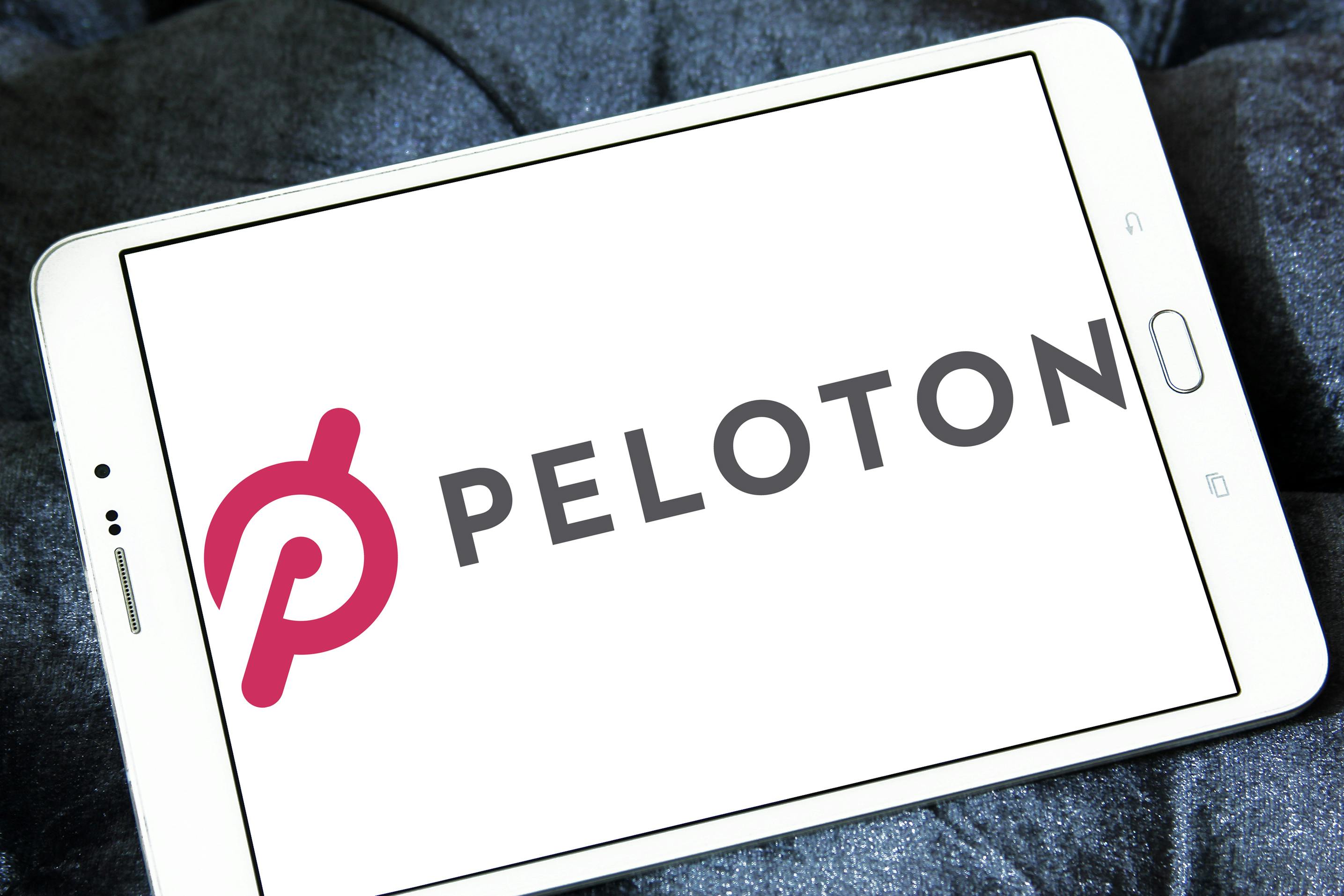 An iPad displaying the Peloton app start-up screen.