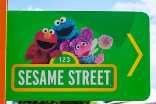 A green sesame street logo