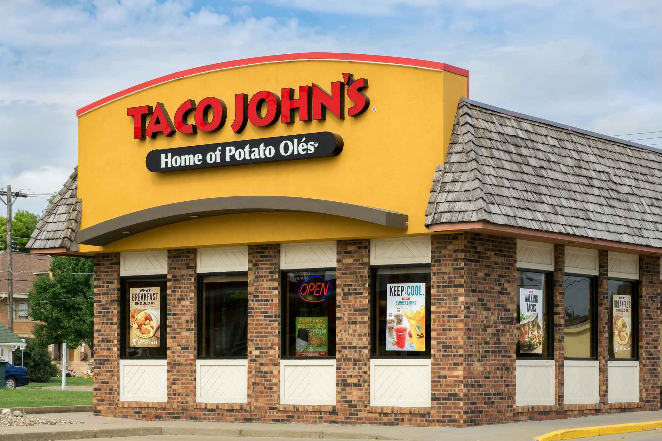 Exterior of a Taco John's restaurant.