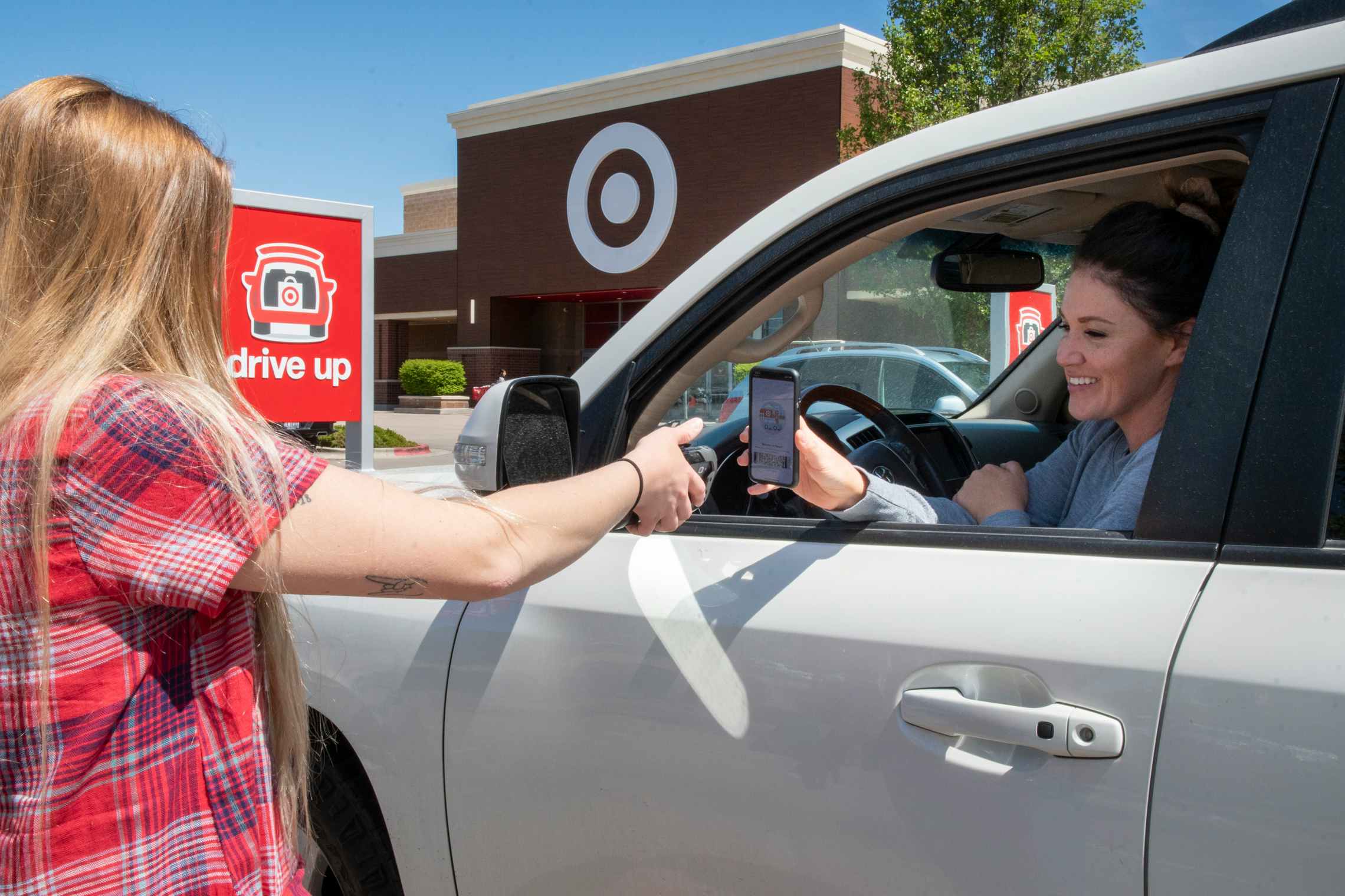 woman does curbside pickup at target