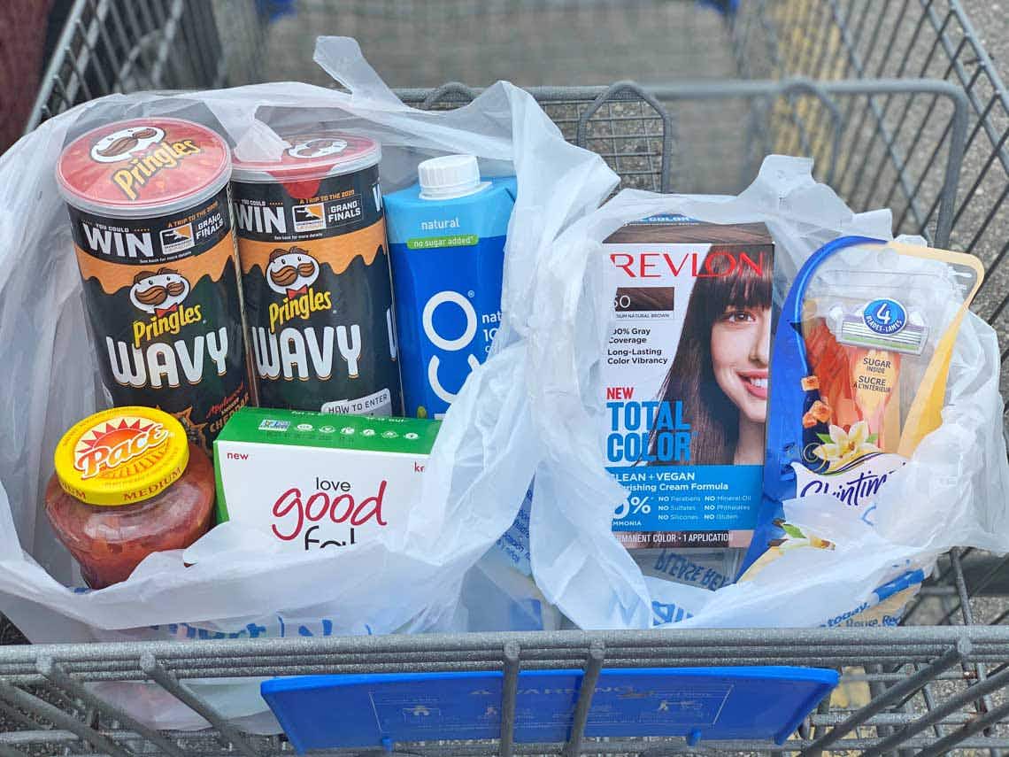 pringes, coconut water, salsa, hair dye, razors, and more items in Walmart pickup bags
