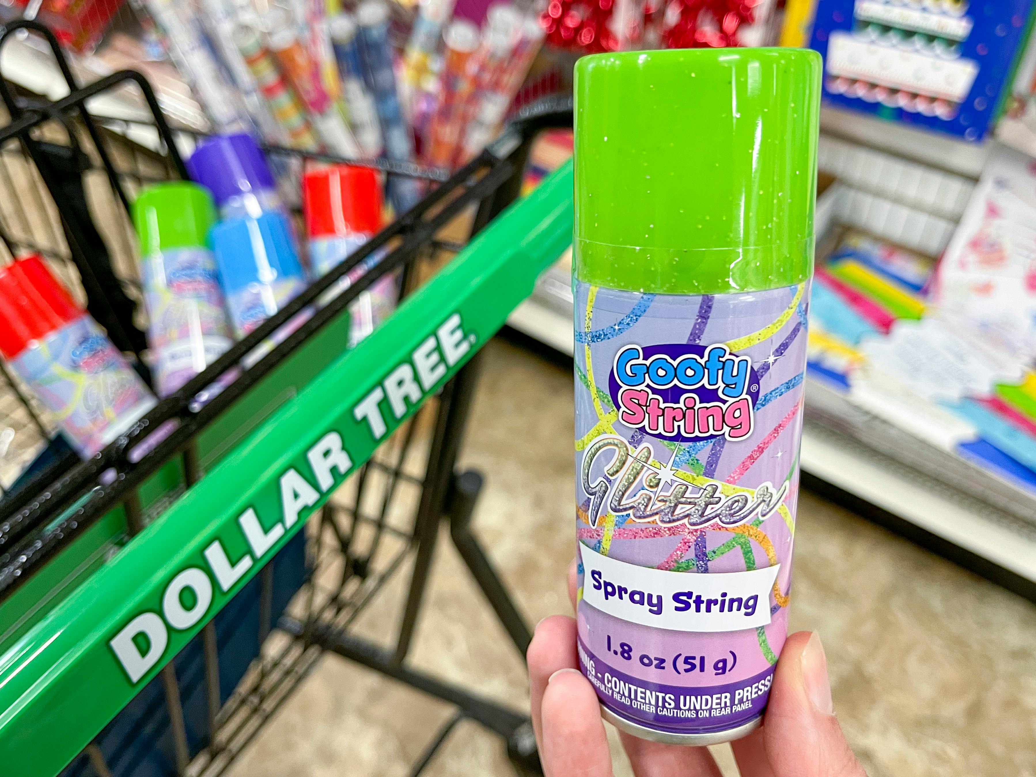 goofy glitter spray string near dollar tree store cart