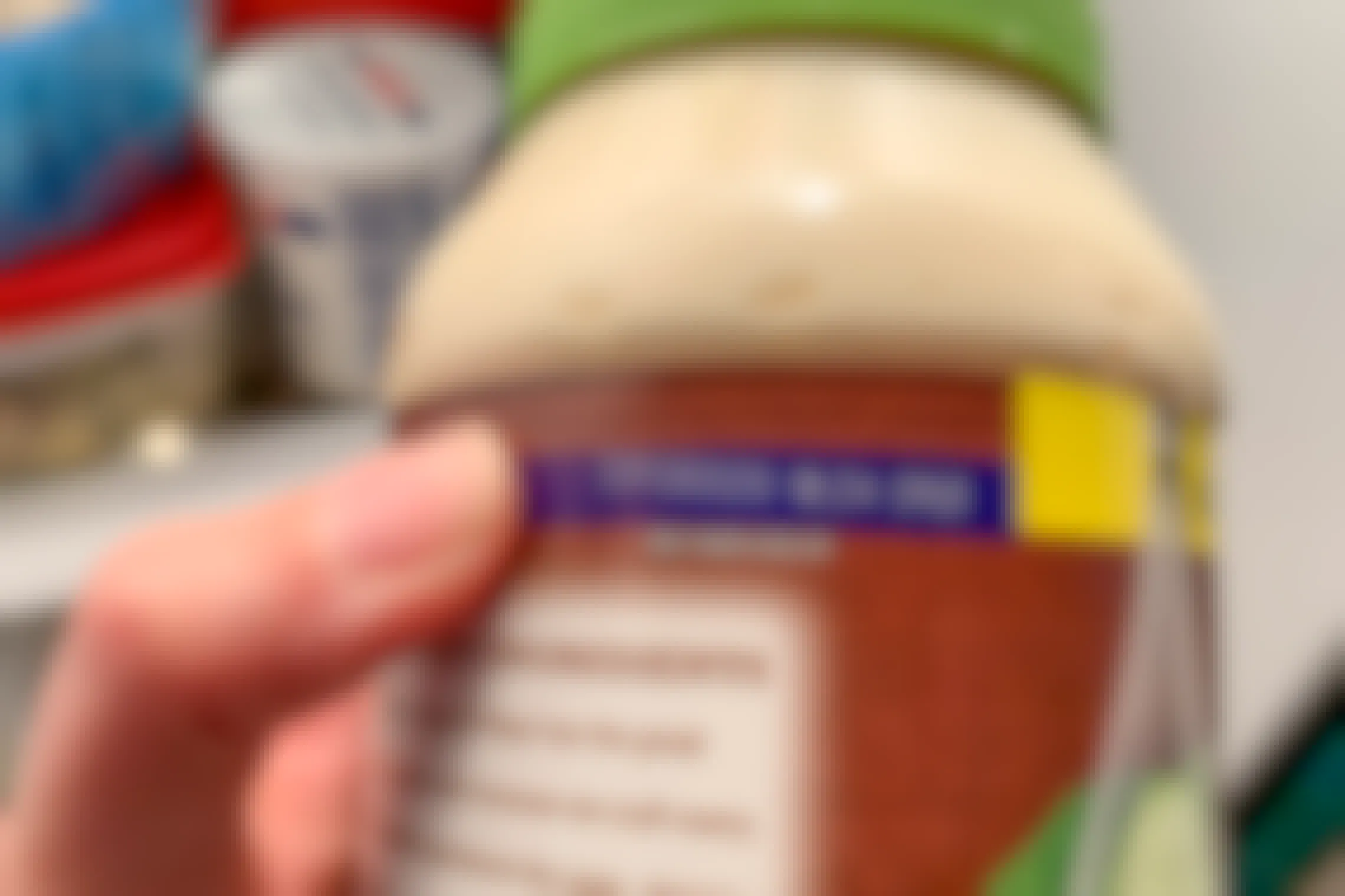 Person pointing to the expiration date on newly expired mayo.