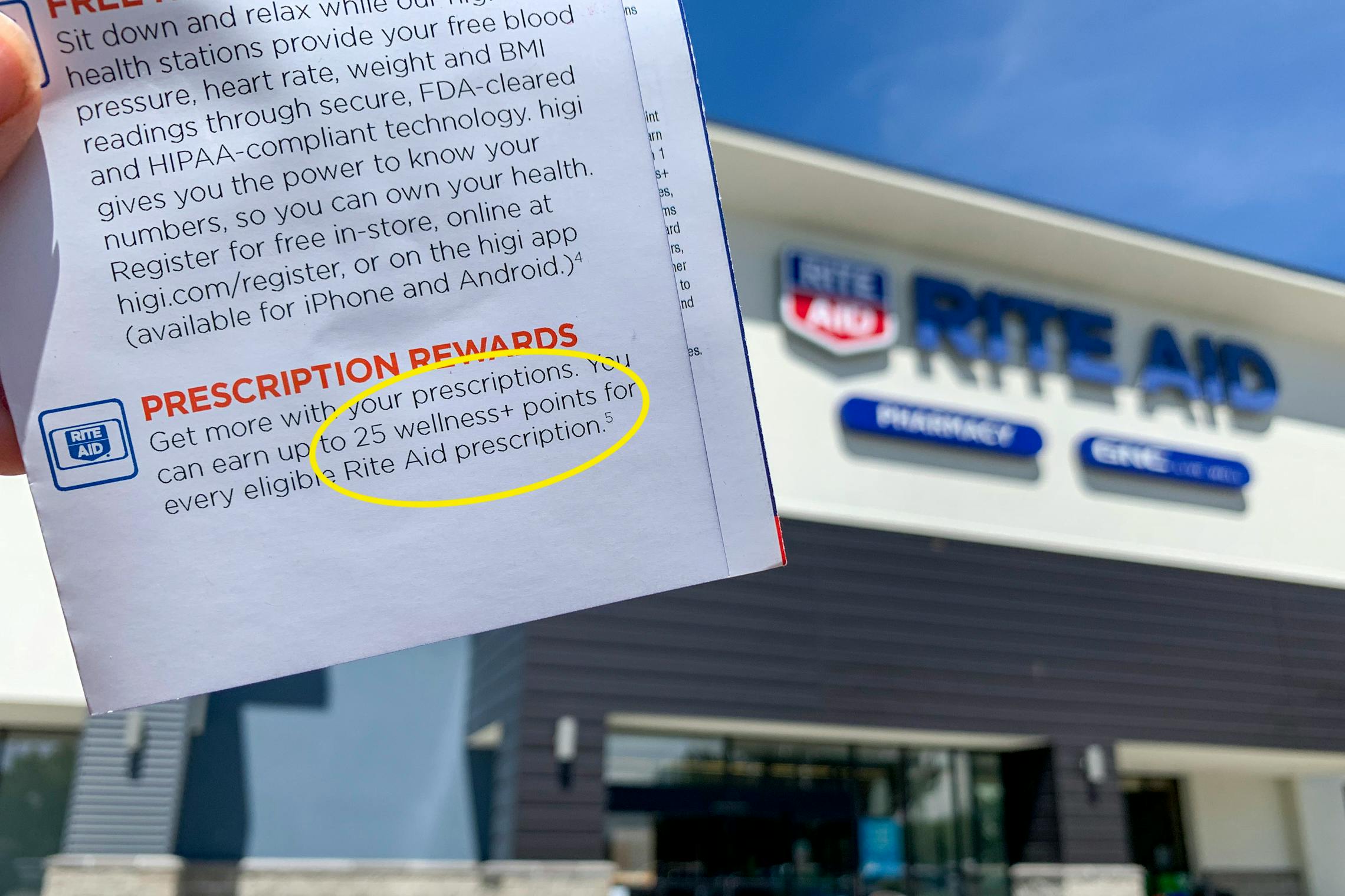 A Rite Aid rewards program pamphlet showing the prescription rewards circled in yellow.