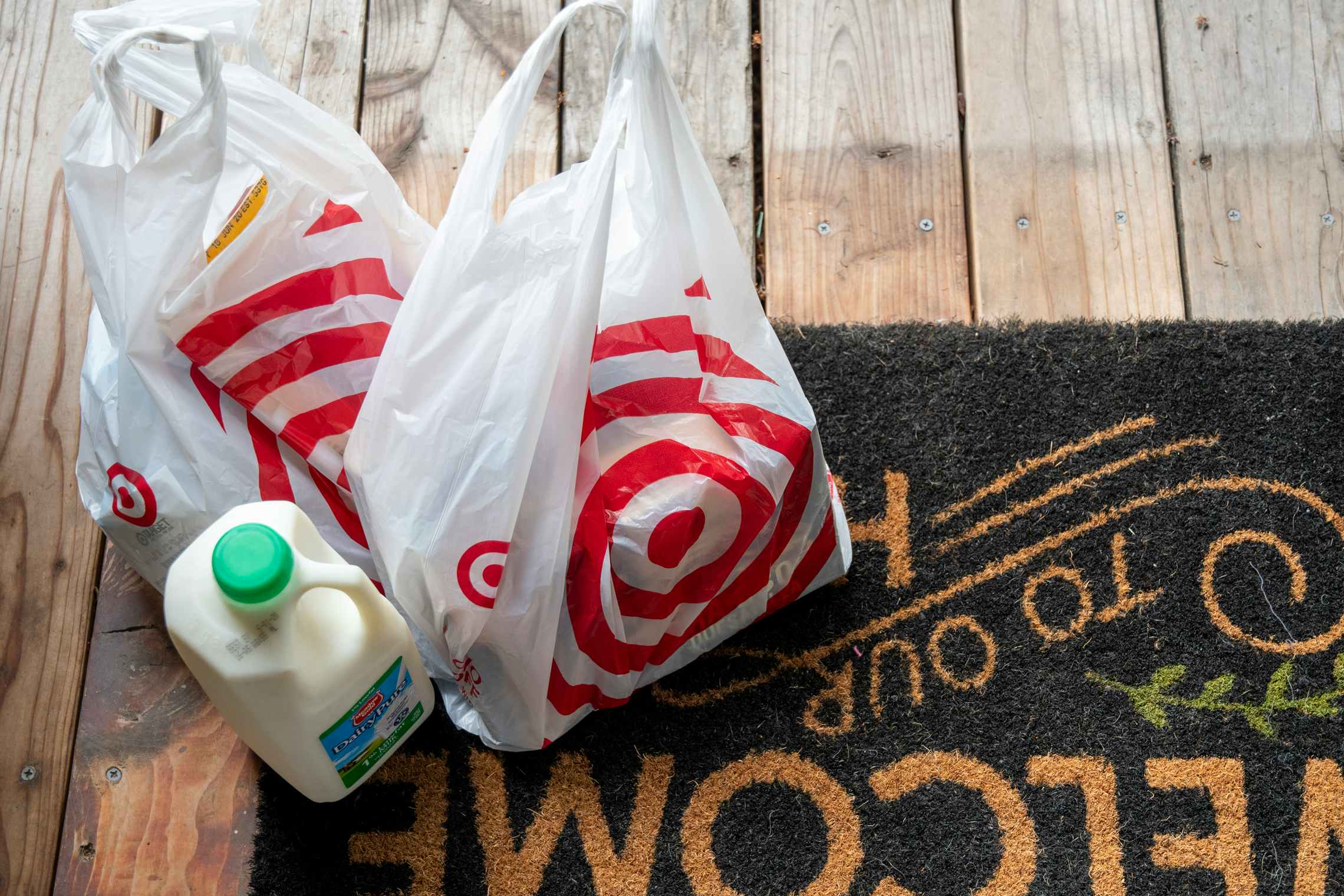 Target Shipt grocery delivery sitting on a doormat.