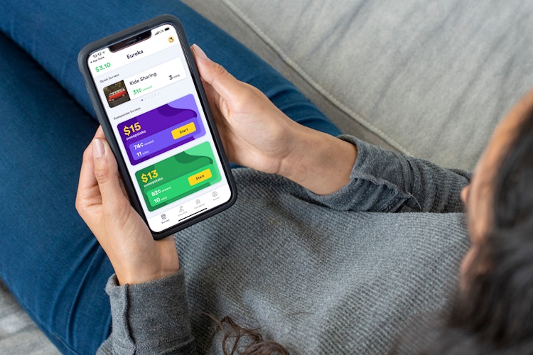 A person looking at a survey app on a cell phone