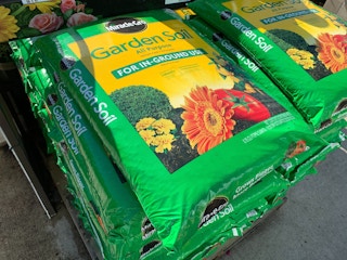 Bags of Miracle Gro garden soil.