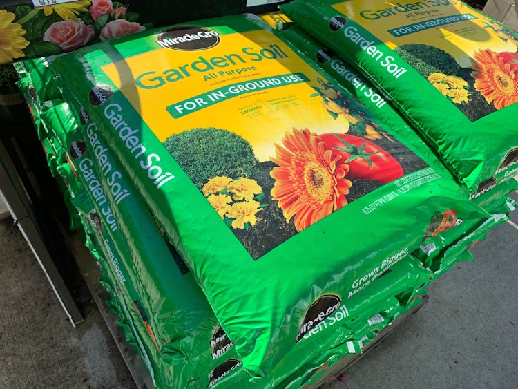 Bags of Miracle Gro garden soil.