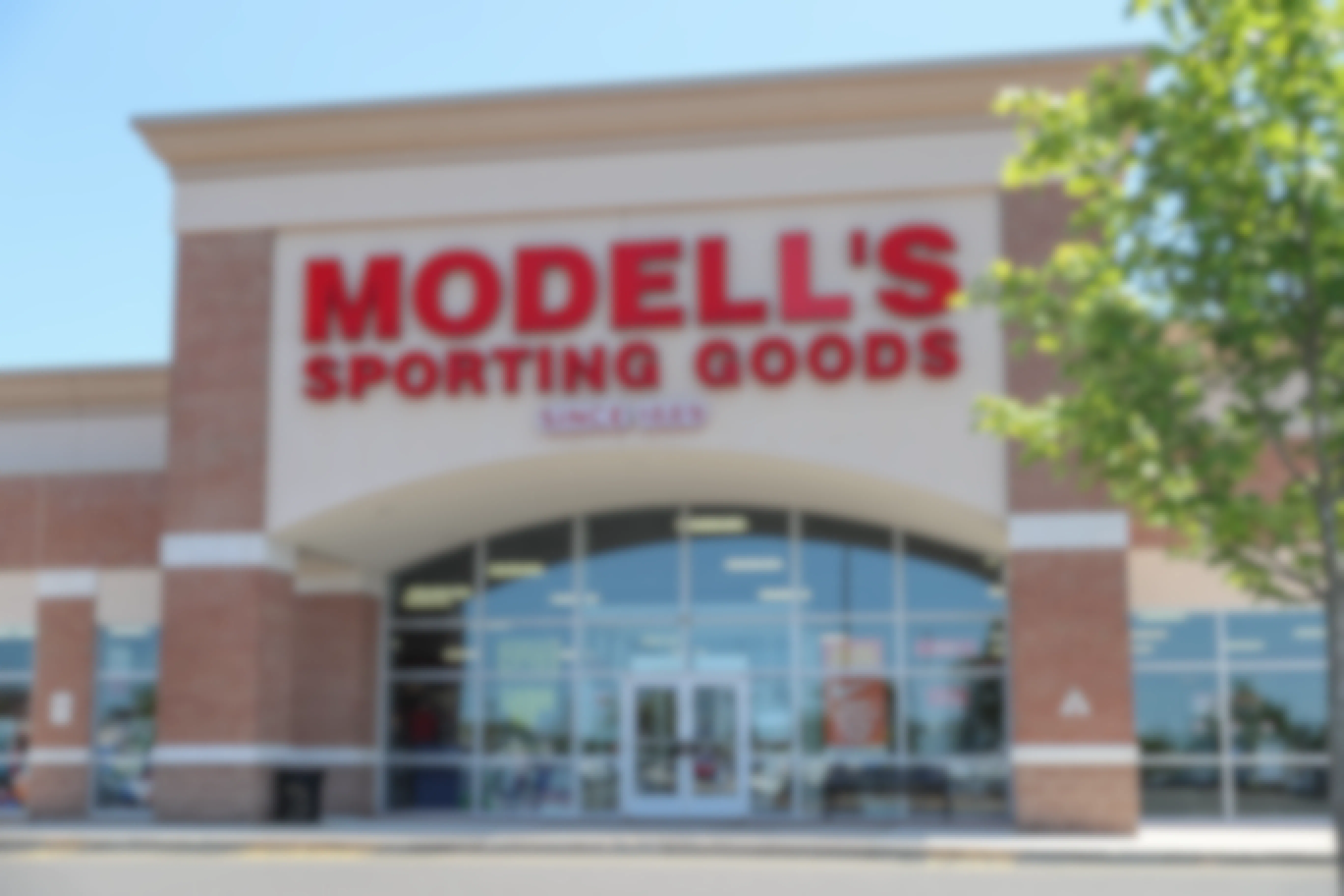 Modell's Sporting Goods retail store location, store front.