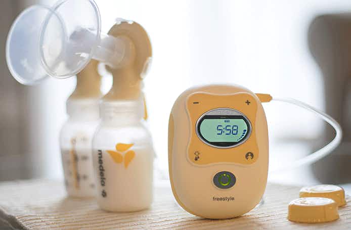 An Aeroflow electric breast pump on a table.