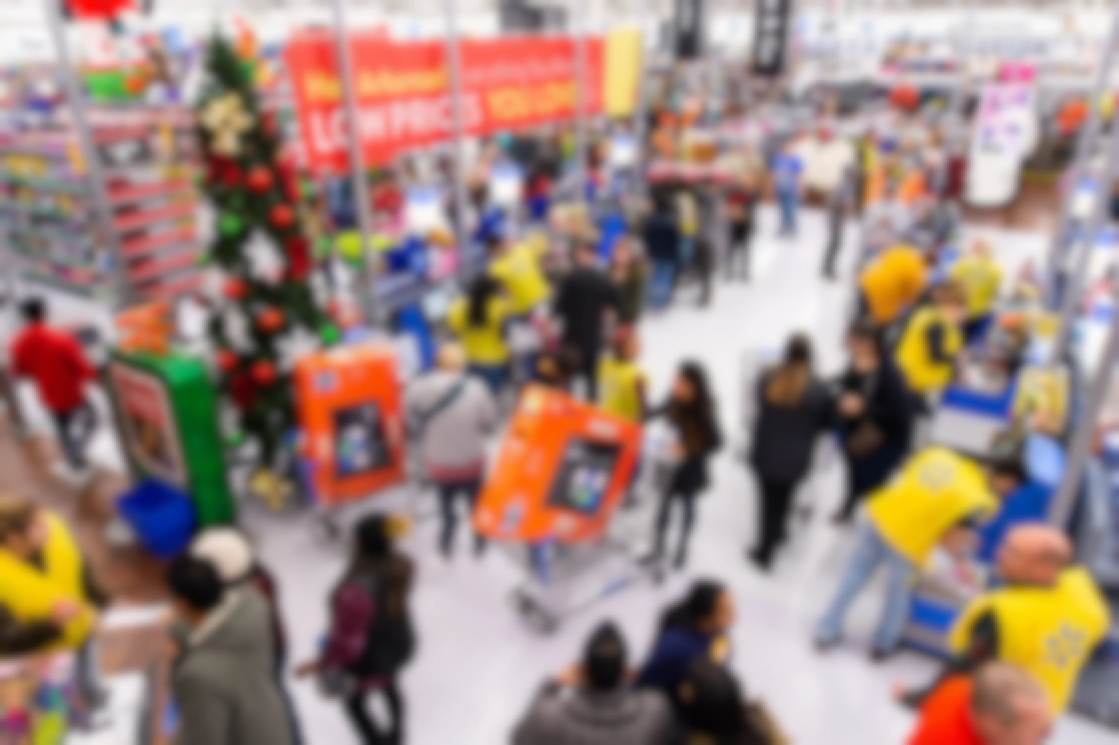 A crowd of people at Walmart checkout during Black Friday