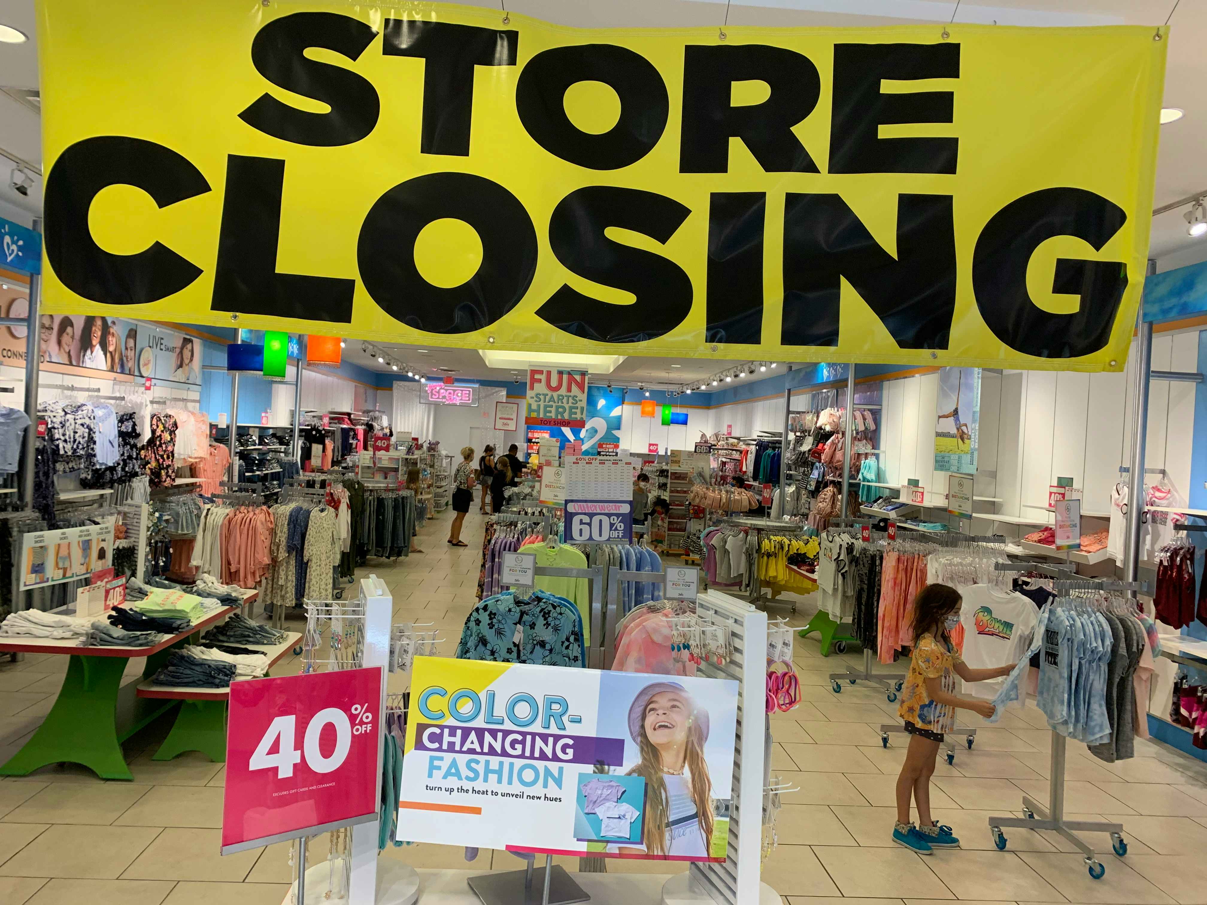 justice store closing banner