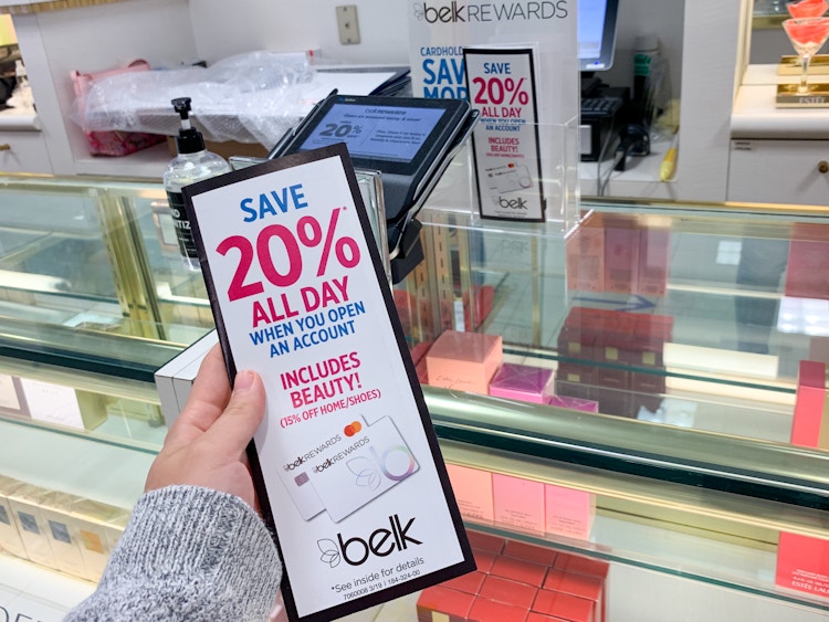 A credit card rewards program pamphlet detailing the Belk rewards program.