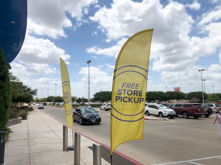 Store pickup signs outside Belk.