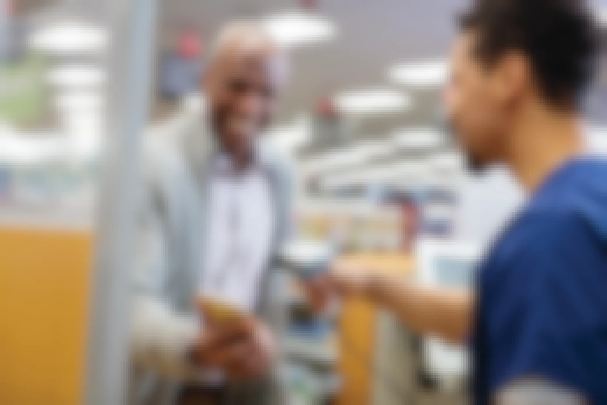 cvs pharmacist scans customer's app at the register