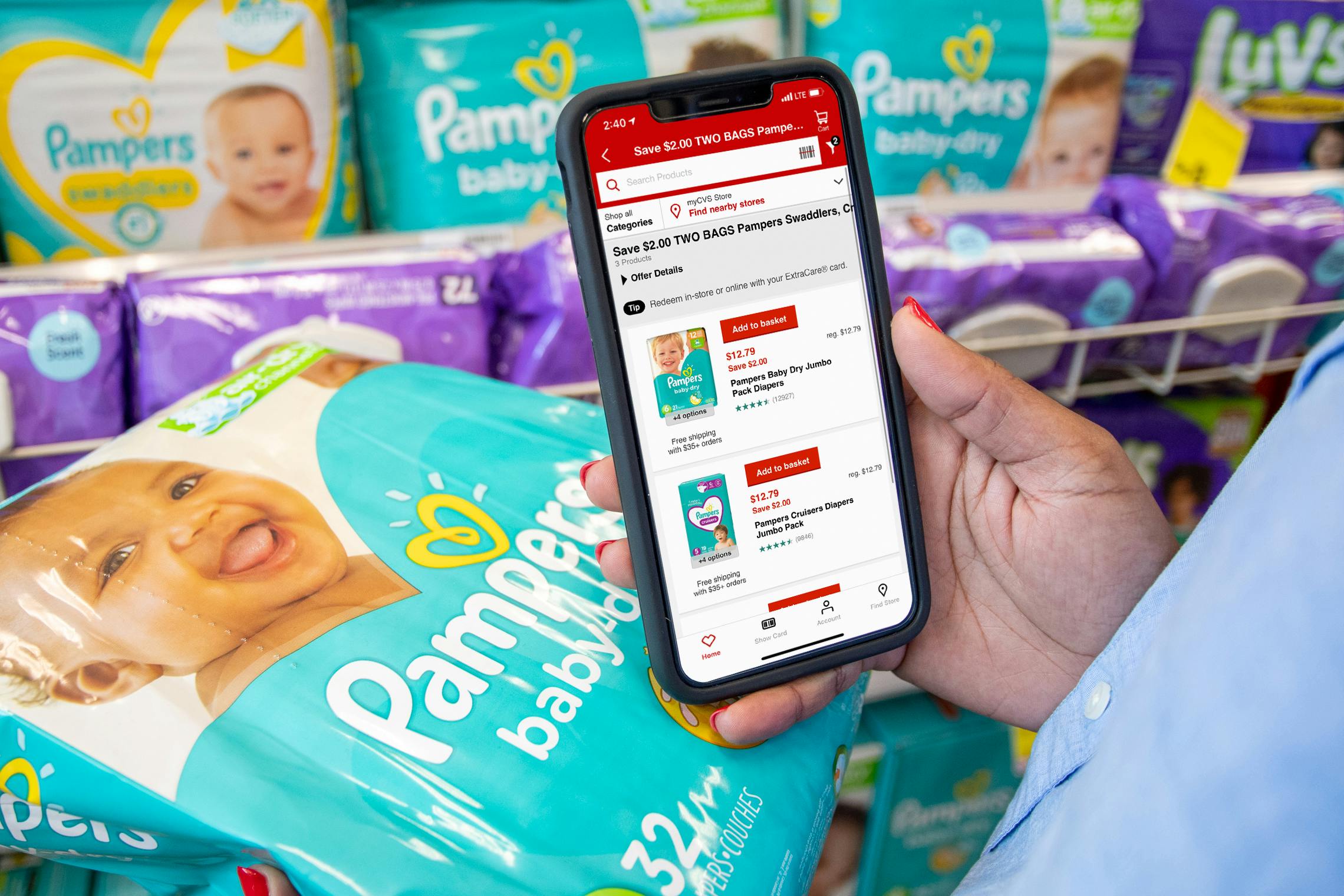 Pampers coupons on the CVS app with a basket holding two packs of pampers diapers.