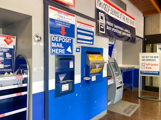A self mailing station at a United States Post Office in Orlando, Florida