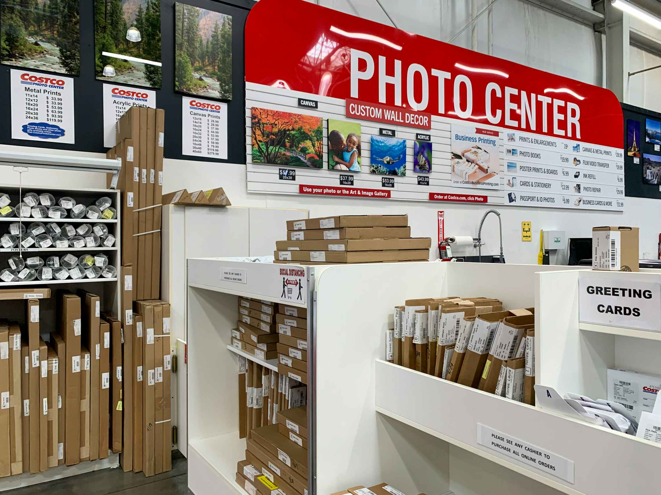 Costco photo center posters and custom prints shelves.