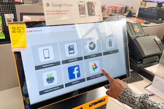woman clicking google photos at cvs