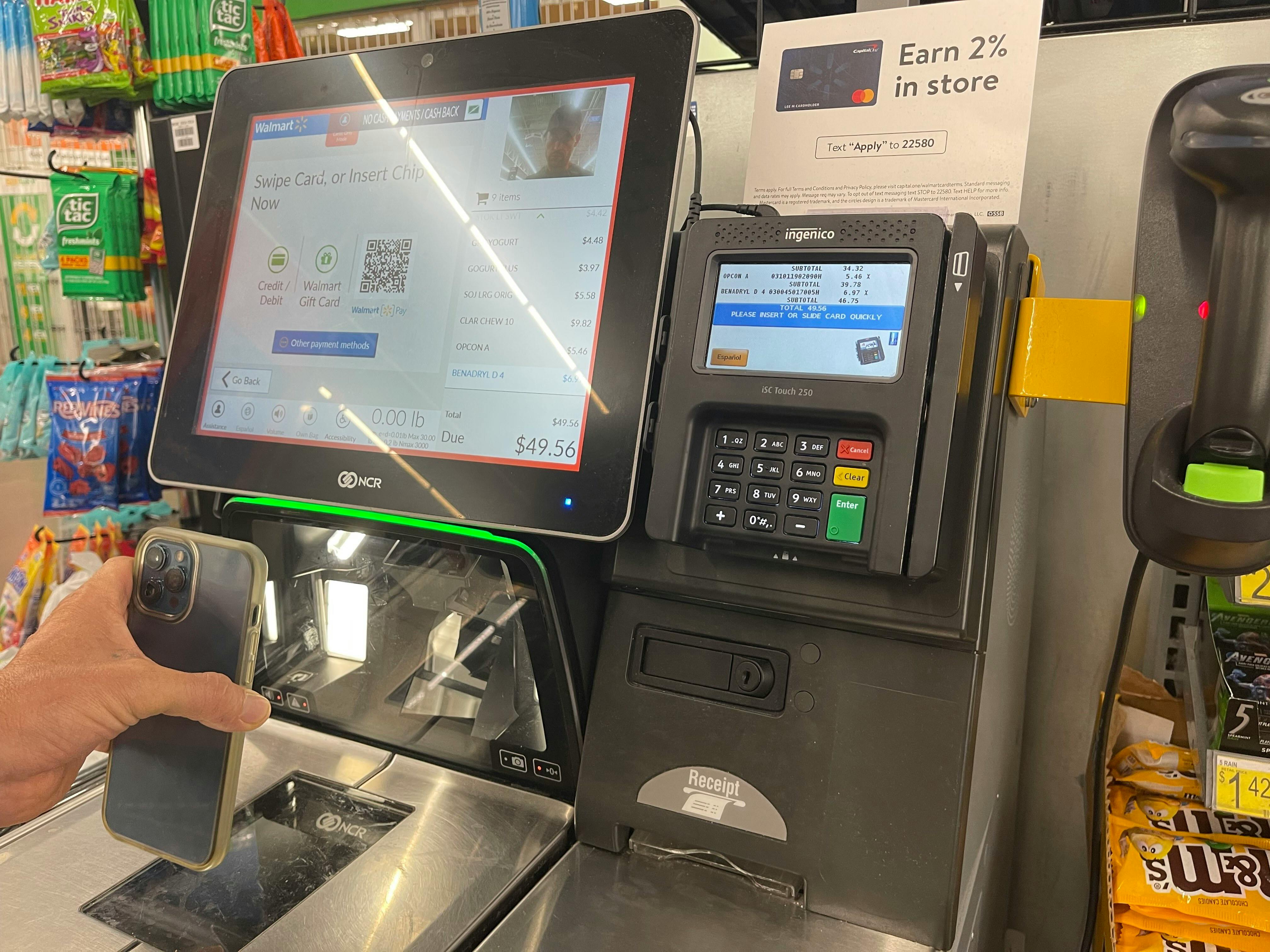 cellphone being scanned at walmart self check out